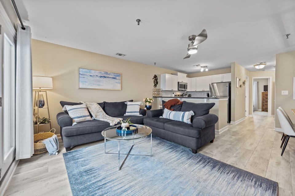 Cozy coastal living room with comfy sofas and an airy open layout