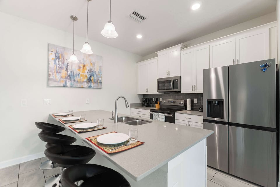 Whip up delicious dishes in the fully stocked kitchen