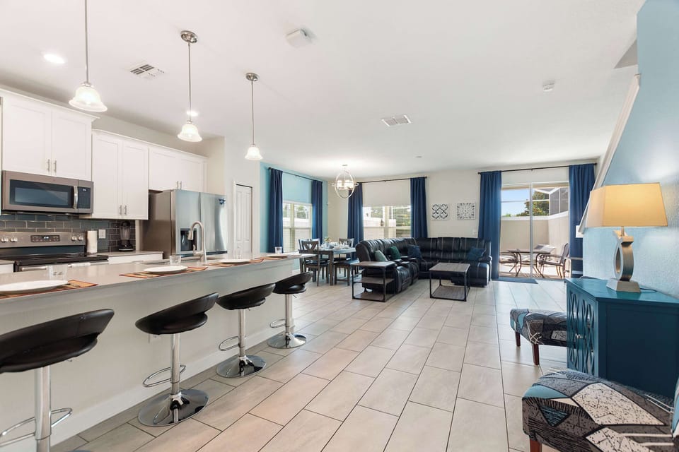 Seamless flow between living, dining, and kitchen areas