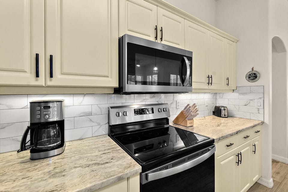 Kitchen with modern appliances and generous counter space