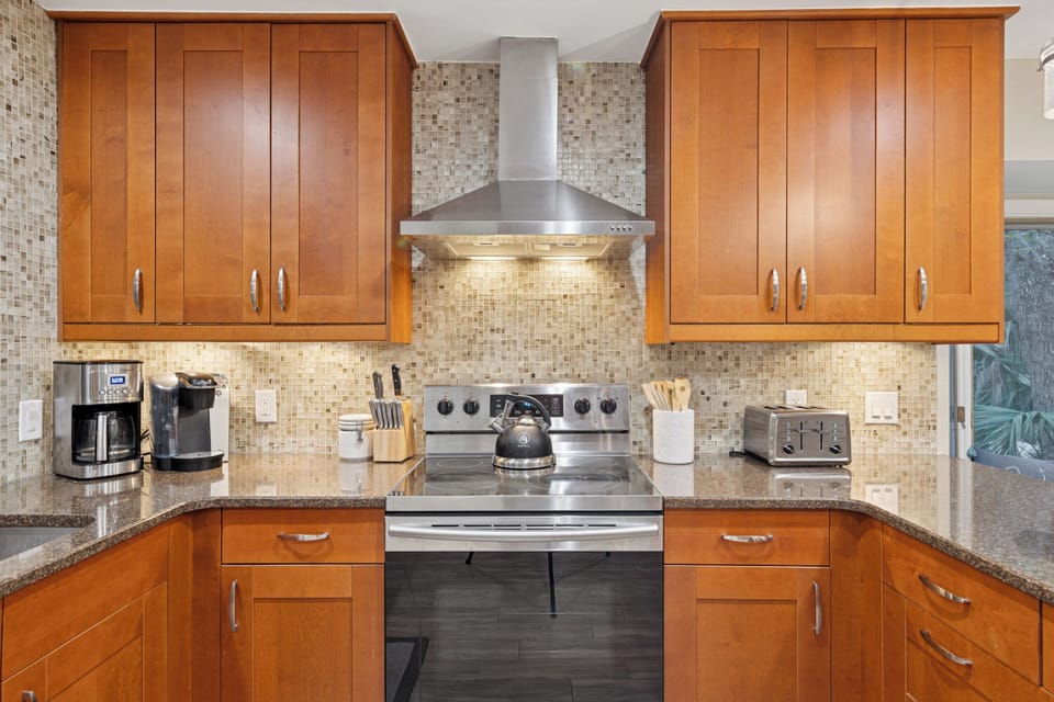 Featuring stainless-steel appliances, multiple areas for natural light, and generous prep space, you're able to craft the perfect meal!