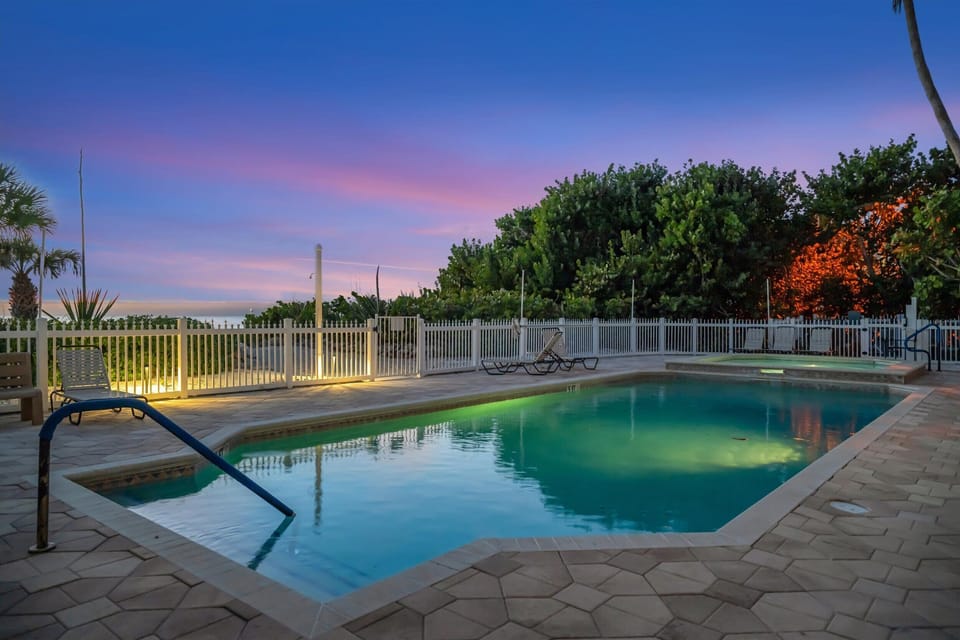 Resort-style pool – unwind with a refreshing swim at sunset