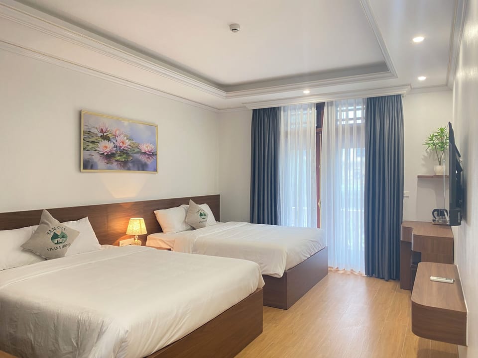 Family Quadruple Room, Balcony, City View | Premium bedding, Select Comfort beds, desk, laptop workspace