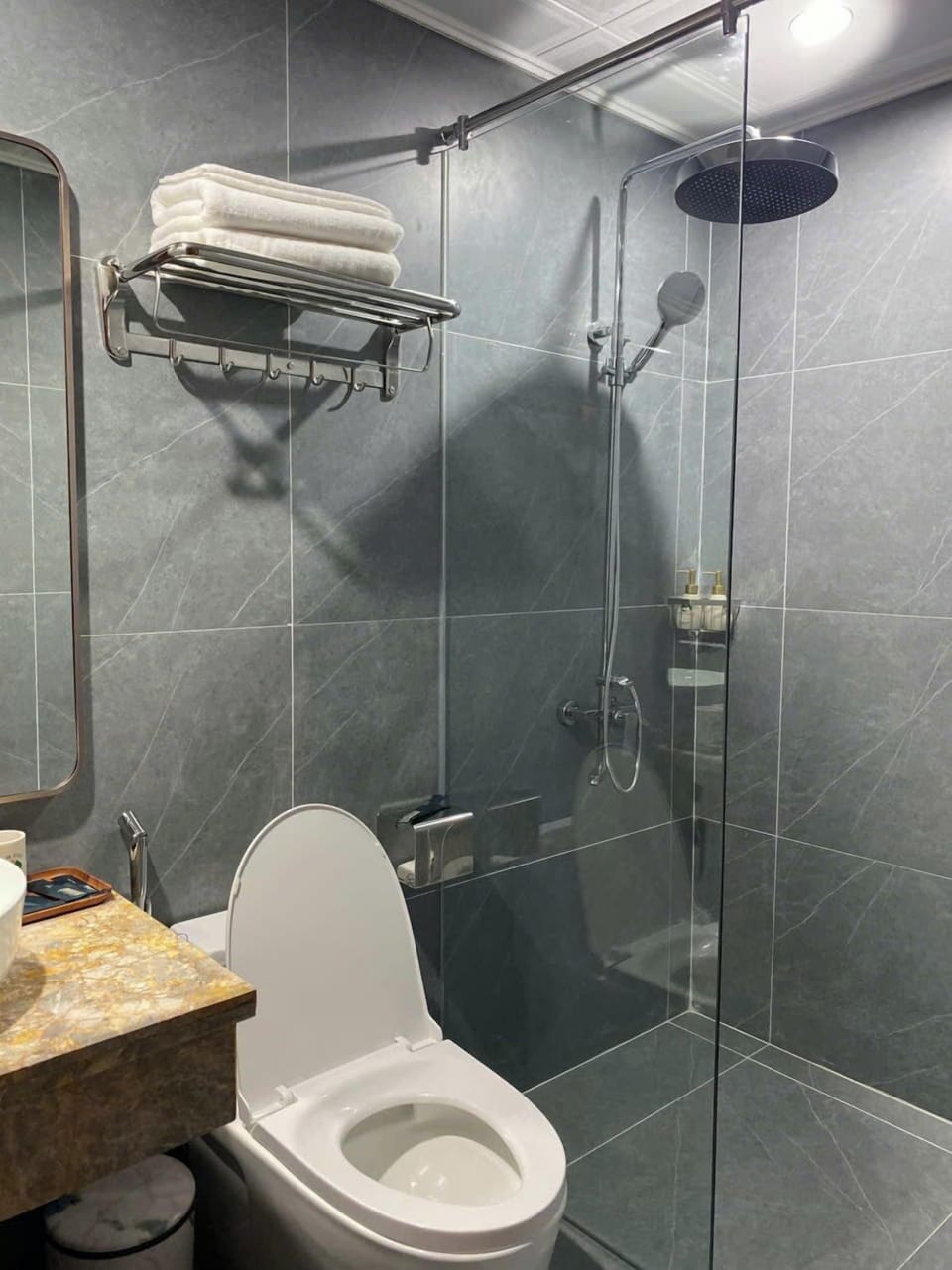 Shower, free toiletries, hair dryer, slippers