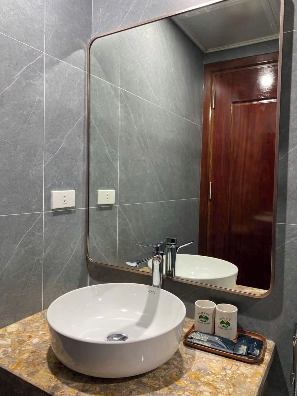 Shower, free toiletries, hair dryer, slippers
