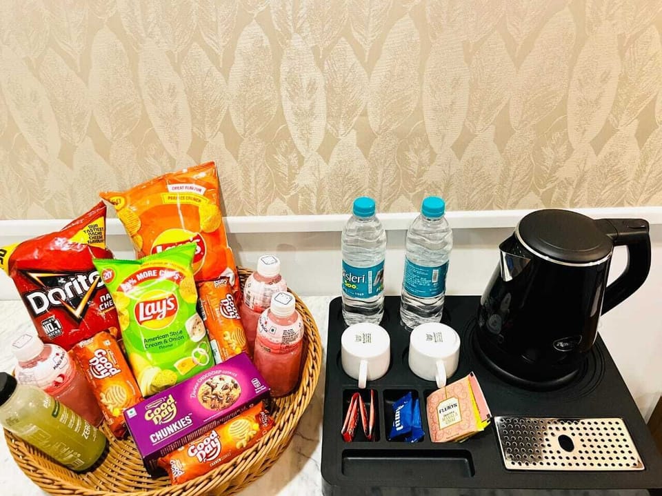 Comfort Studio, City View | Living area | 42-inch LCD TV with digital channels, pay movies, streaming services