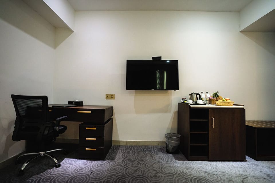 Deluxe Single Room, City View | In-room safe, iron/ironing board, free WiFi
