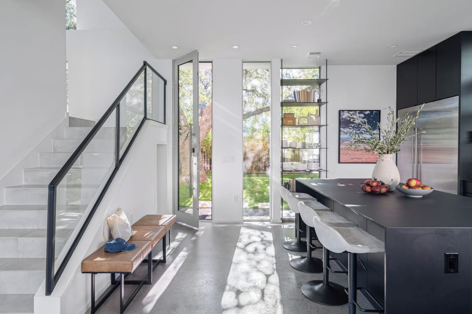Unit 1304A: Kitchen with barstool seating.