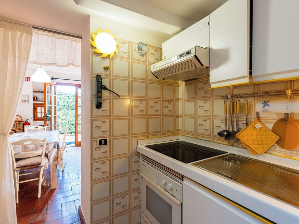 Interior Design, Flooring, Kitchen, Wood, Floor, Ceiling, Countertop, Room, Lighting, Major Appliance