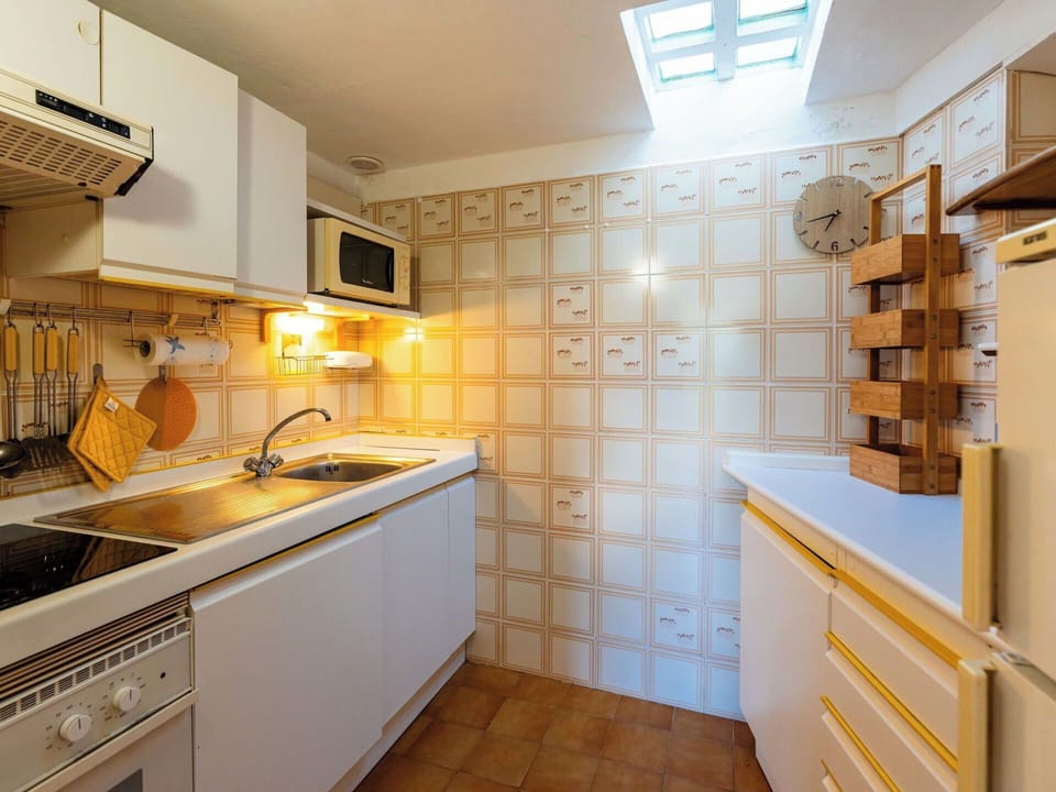 Kitchen, Countertop, Interior Design, Flooring, Kitchen Appliance, Wood, Major Appliance, Ceiling, Cabinetry, Floor
