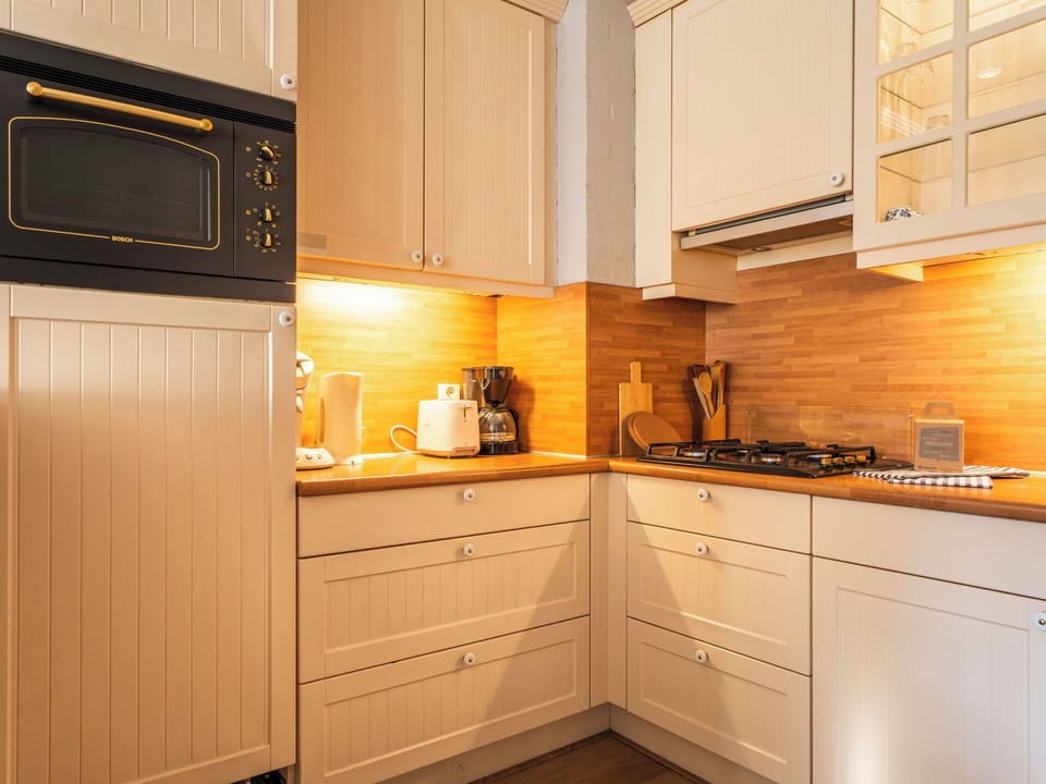 Kitchen Appliance, Kitchen, Cabinetry, Countertop, Major Appliance, Wood, Interior Design, Flooring, Furniture, Home Appliance