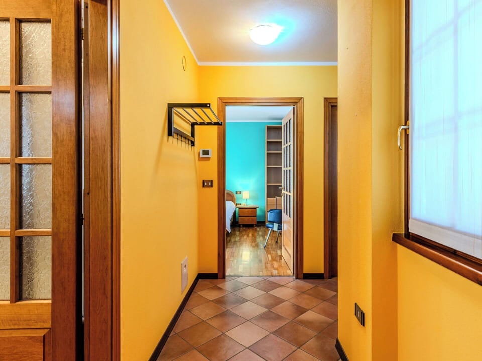 Flooring, Interior Design, Wood, Floor, Ceiling, Yellow, Door, Room, Wood Stain, Apartment