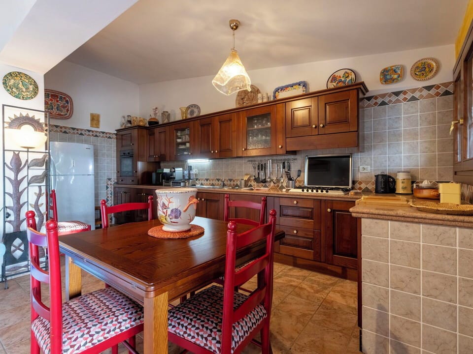 Furniture, Kitchen, Interior Design, Cabinetry, Flooring, Countertop, Wood, Room, Kitchen Appliance, Floor