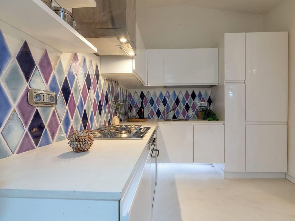Kitchen, Kitchen Appliance, Interior Design, Countertop, Major Appliance, Flooring, Floor, Tile, Kitchen Stove, Room