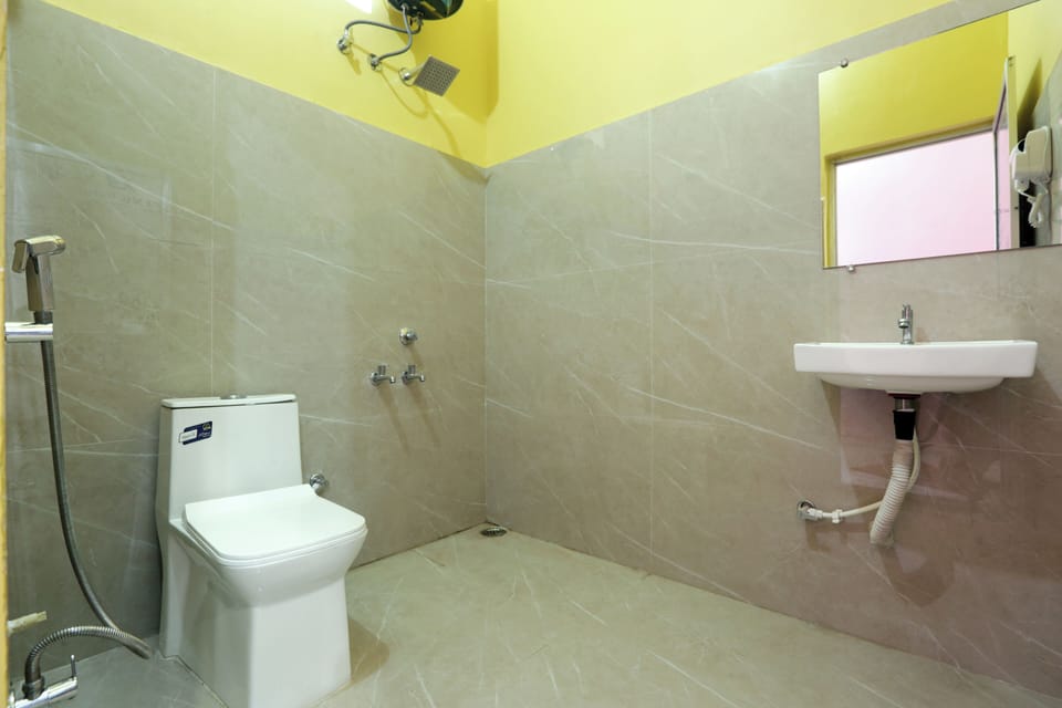 Shower, hair dryer, slippers, towels