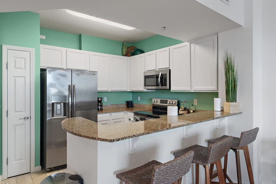 Gather around the spacious breakfast bar for a casual bite.