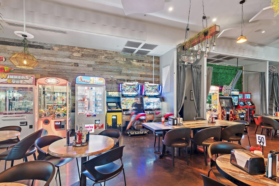 Step into a world of fun where you can challenge friends to arcade games, win prizes, and enjoy a vibrant atmosphere. This lively space is perfect for making unforgettable vacation memories.
