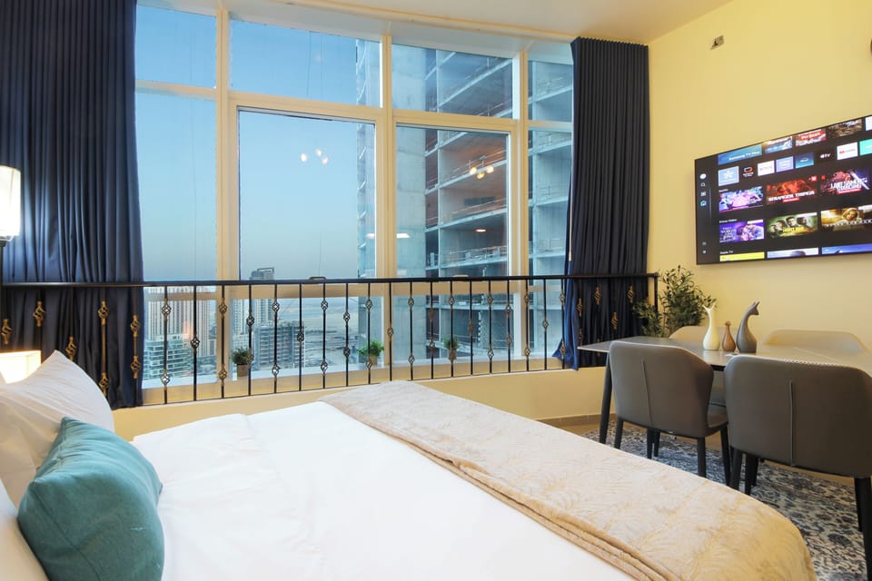 Luxury Studio, 1 King Bed, Lake View, Oceanfront | Laptop workspace, iron/ironing board, free WiFi