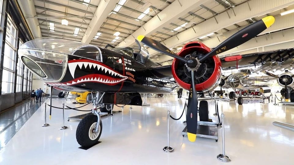 The Lyon Air Museum in Santa Ana, CA, showcases World War II history with military aircraft, rare automobiles, vehicles, motorcycles, and memorabilia, all located beside John Wayne Airport.