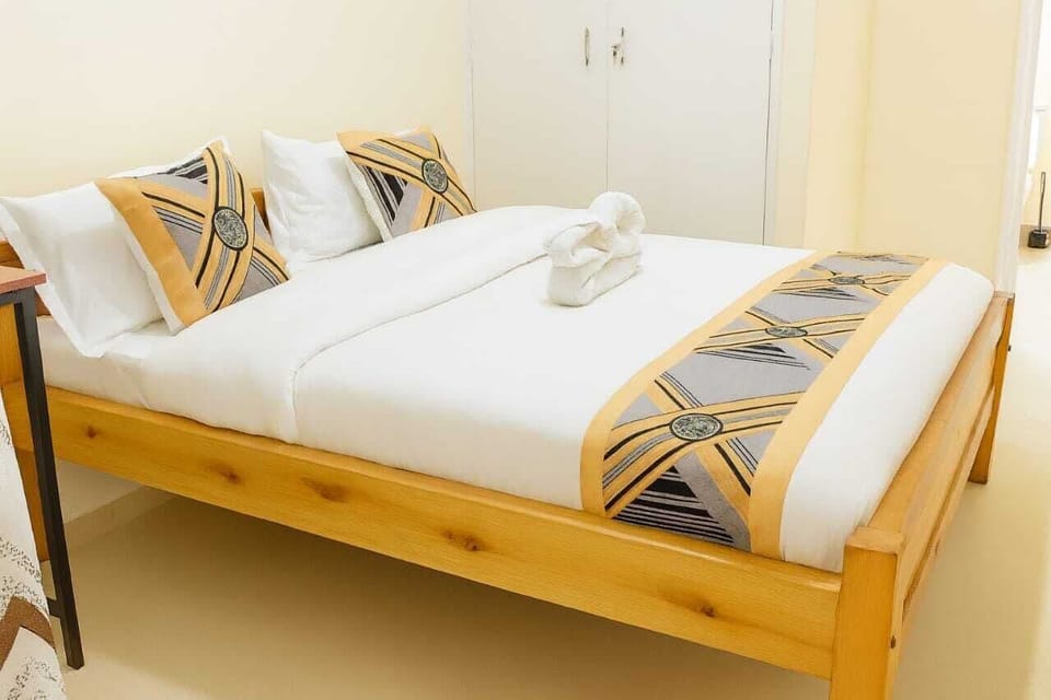 Deluxe Double Room, City View | Desk, laptop workspace, blackout drapes, iron/ironing board