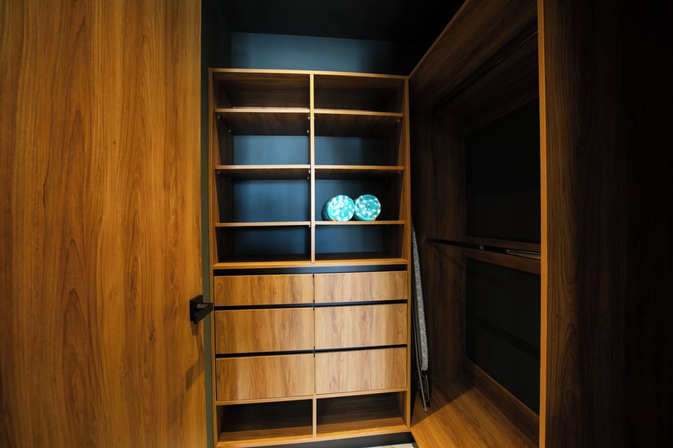 Large walk-in closet offering plenty of storage space