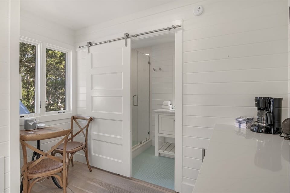 ADJACENT BISTRO DINING FOR TWO AND FULL BATH ON 2ND LEVEL