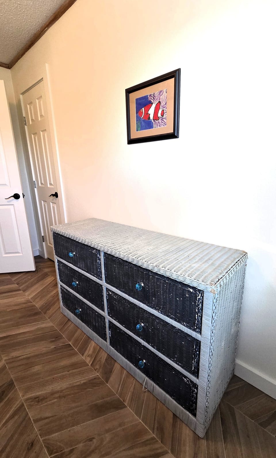 The bunk room also has a chest of drawers for storage.