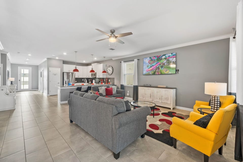 Relax after a day at the parks in this open and inviting living area.