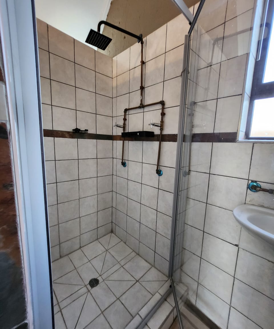 Luxury Room, Patio, Pool View | Bathroom | Shower, towels, soap, shampoo