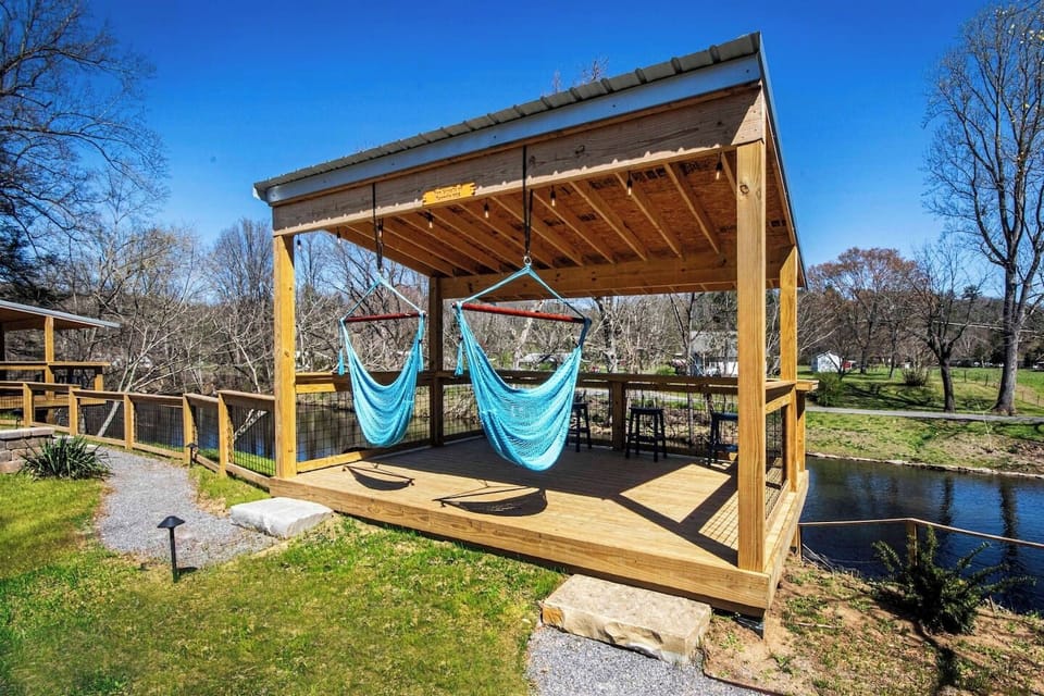 Hammocks, Bar top, plus bar stools to enjoy a tasty beverage on the deck overlooking the Little River. 