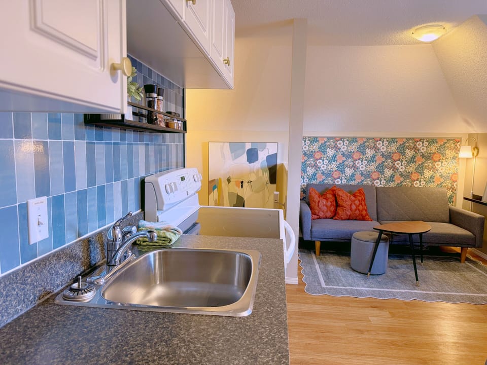 Open concept kitchen/dining/living areas