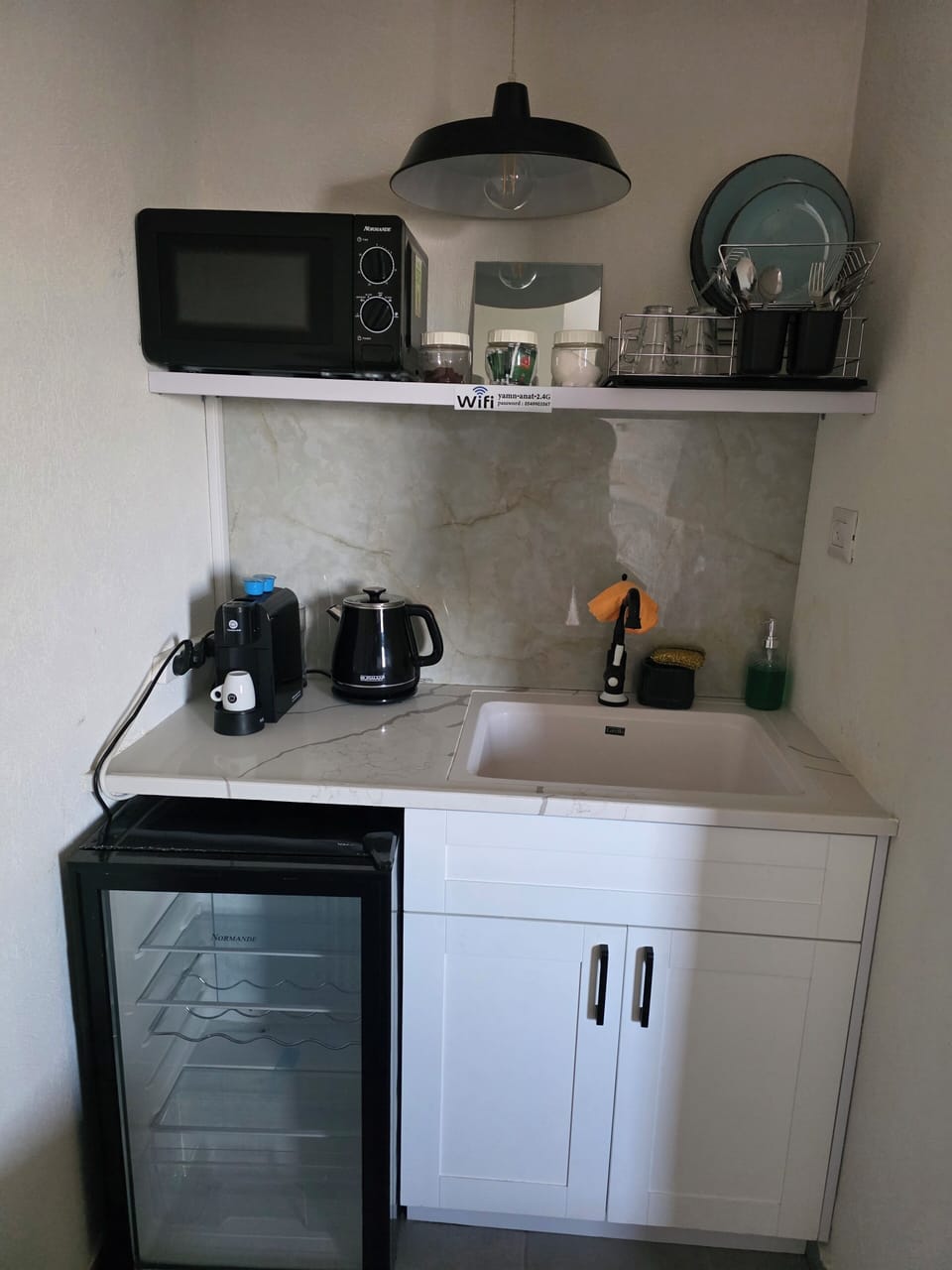 Mini-fridge, microwave, cookware/dishes/utensils