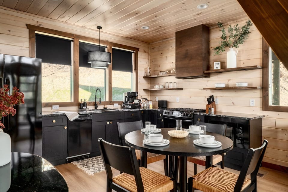 Enjoy meals together in the intimate dining area, perfectly sized for four.
