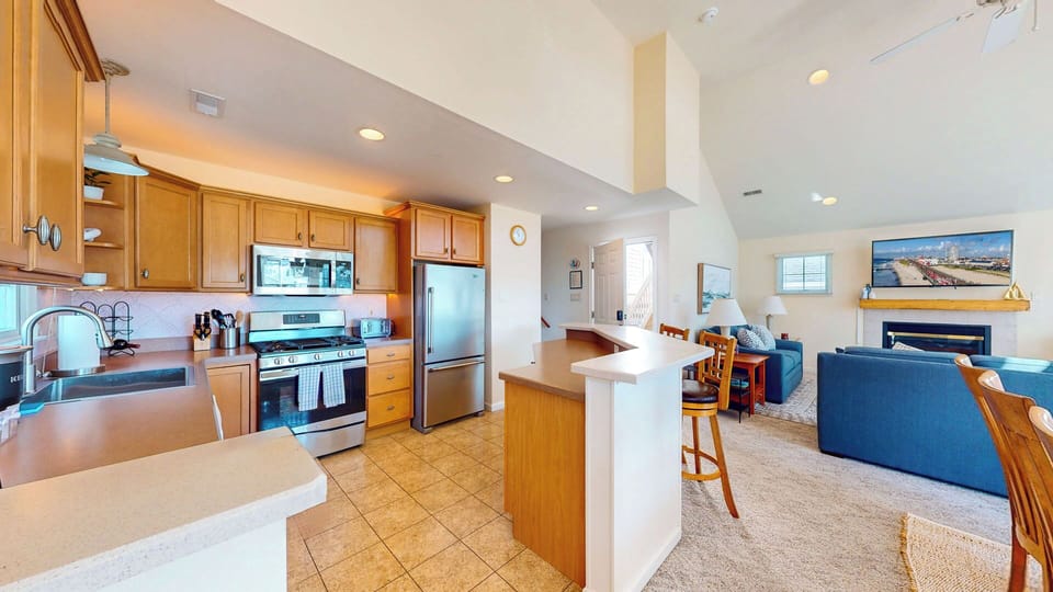 Spacious kitchen area with high end amenities 