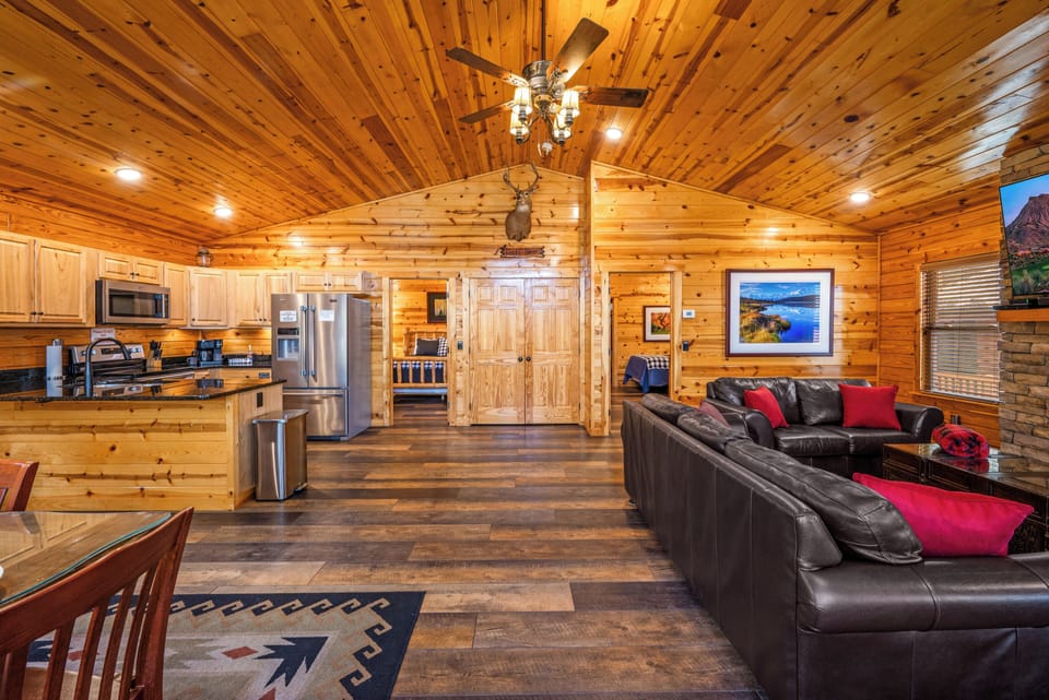 Step inside the cabin to warm wood tones, open space, and inviting comfort