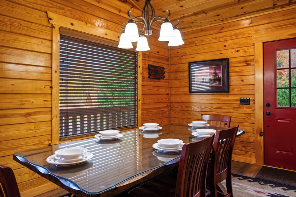 Spacious dining table seats six comfortably for shared meals and memories