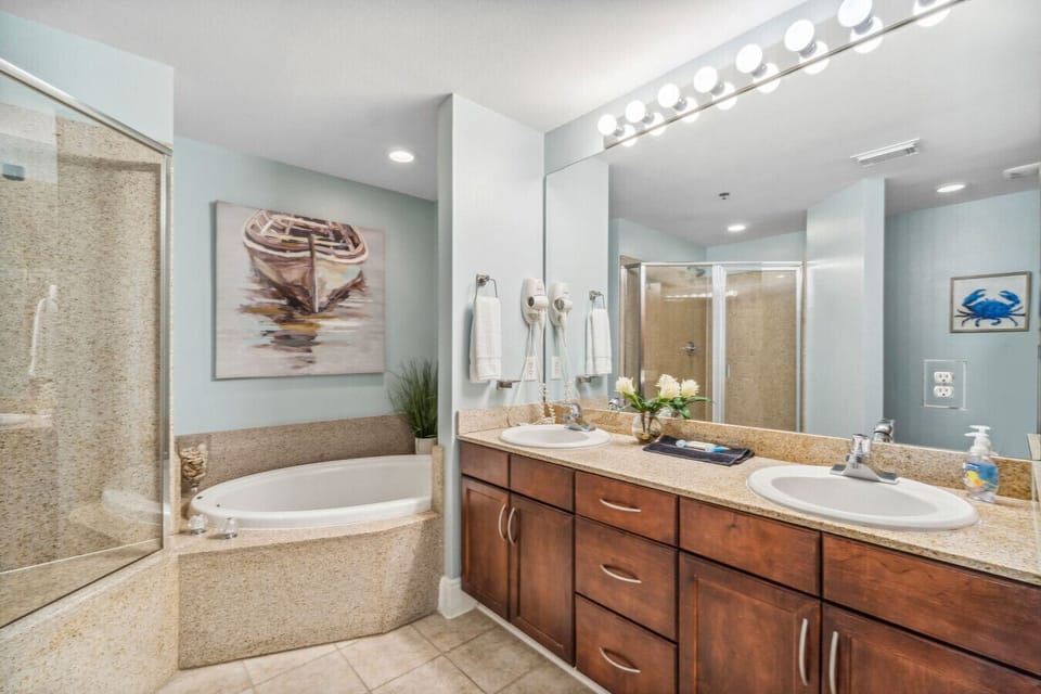 Relax in the spa-style bathroom featuring a walk-in shower and large soaking tub