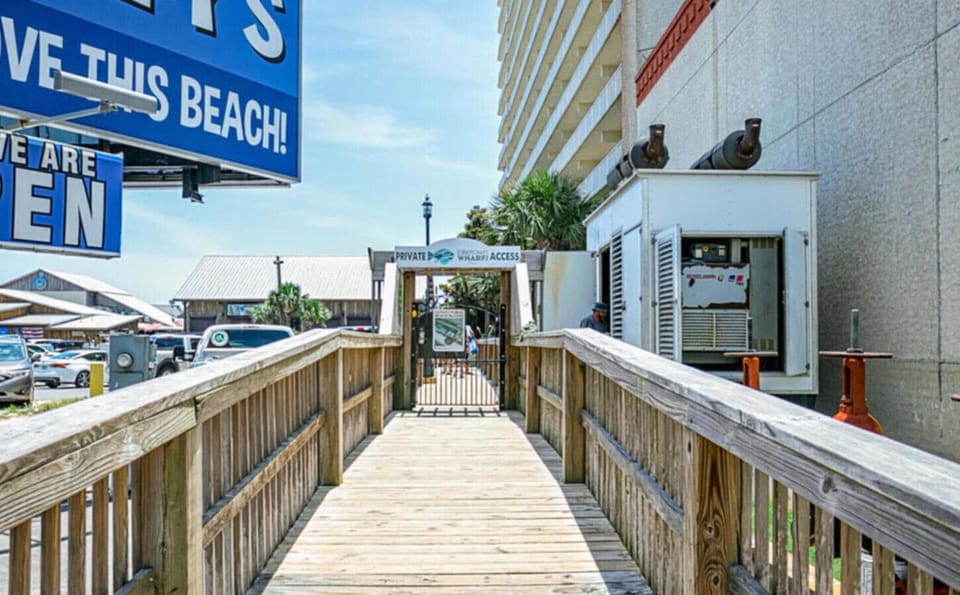 Private Laketown Wharf boardwalk to the beach—just steps from the sand