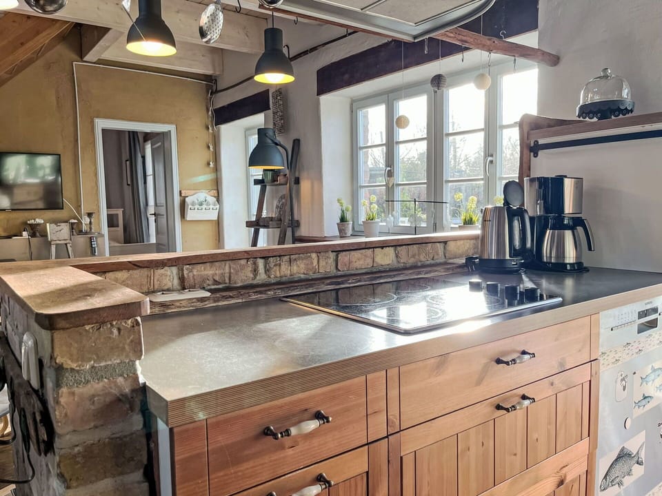 Furniture, Kitchen, Countertop, Cabinetry, Flooring, Interior Design, Wood, Kitchen Appliance, Ceiling, Floor
