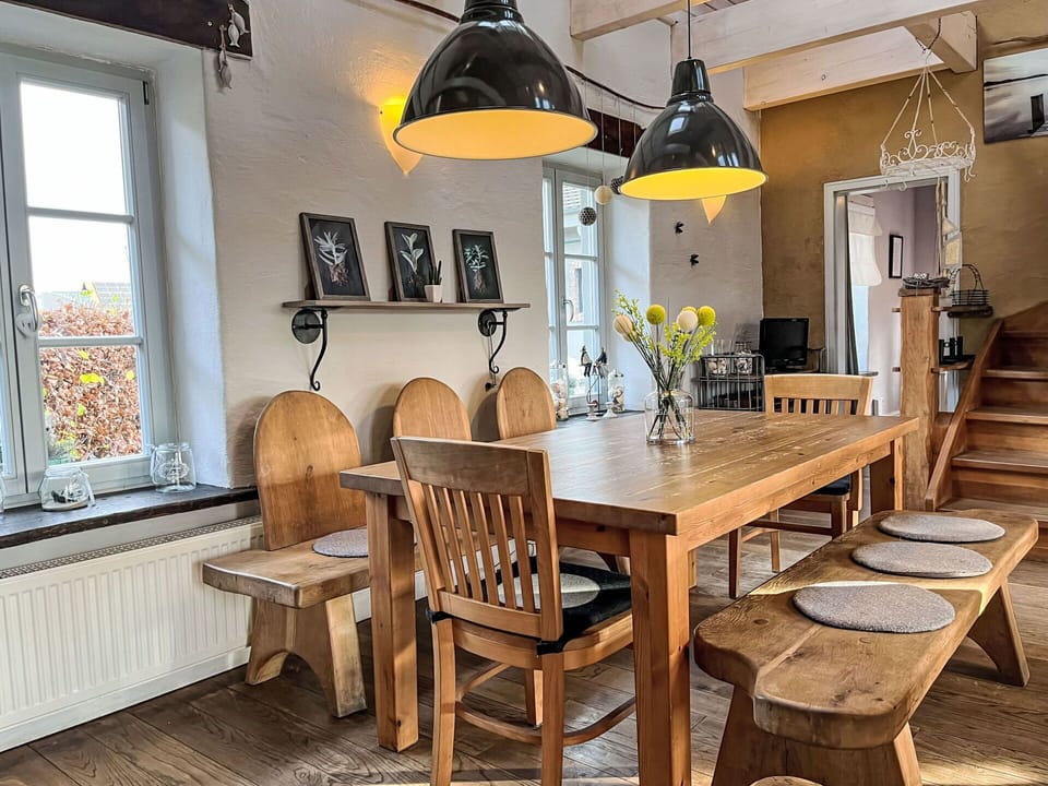 Furniture, Interior Design, Flooring, Chair, Wood, Wood Flooring, Floor, Table, Light Fixture, Dining Room