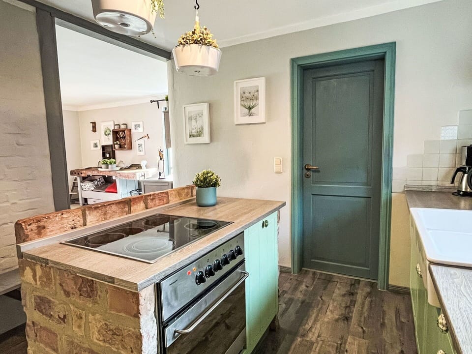 Kitchen, Countertop, Kitchen Appliance, Furniture, Cabinetry, Interior Design, Flooring, Major Appliance, Wood, Floor