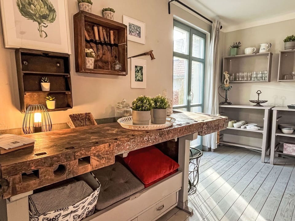 Furniture, Interior Design, Flooring, Wood, Kitchen, Floor, Home, Countertop, Cabinetry, Room