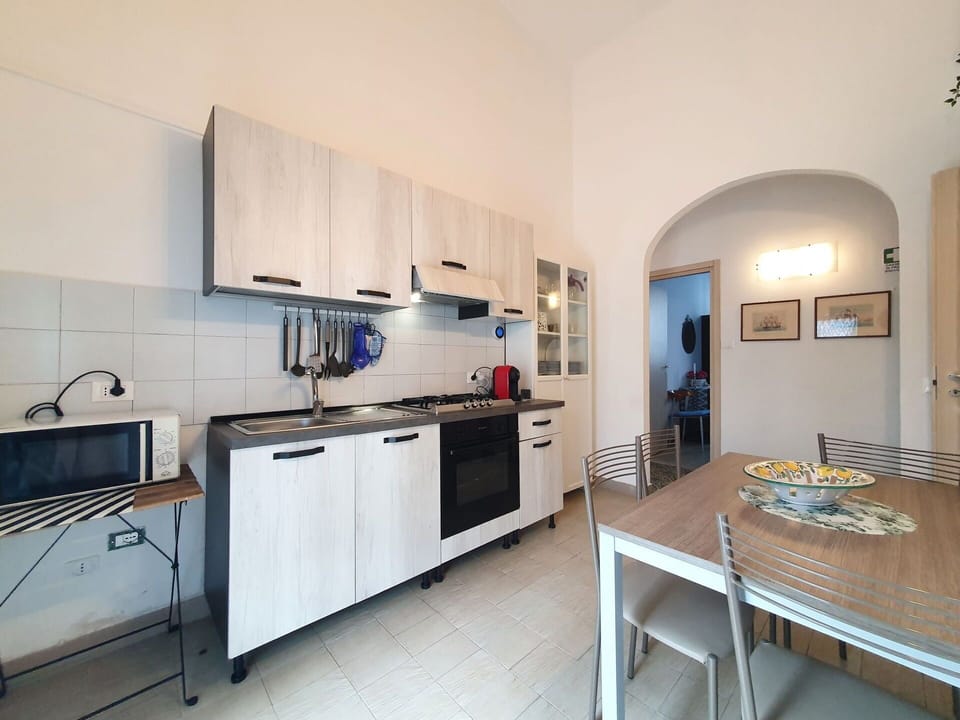 Furniture, Flooring, Interior Design, Floor, Room, Ceiling, Apartment, Countertop, Chair, Kitchen