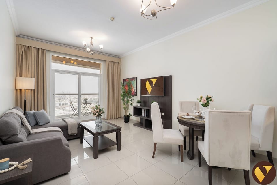 Luxury Apartment, Balcony, City View | Living area | 65-inch Smart TV with cable channels