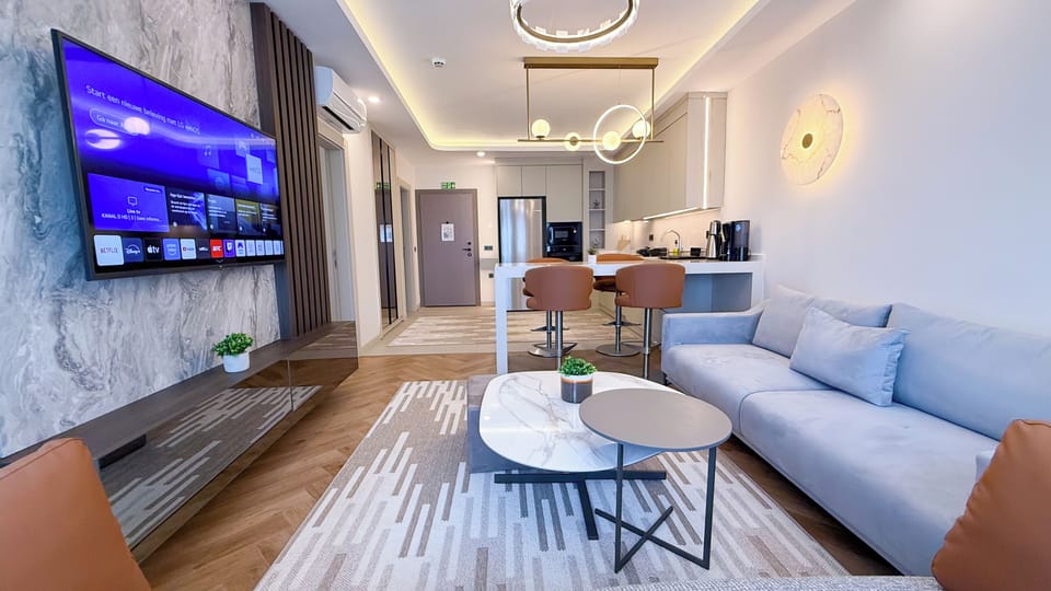 Deluxe Condo, City View | Desk, laptop workspace, iron/ironing board, free WiFi
