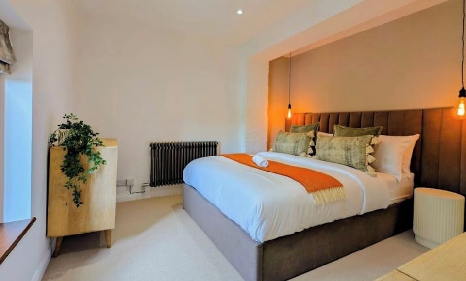 Watch the river flow from your comfortable bed!
