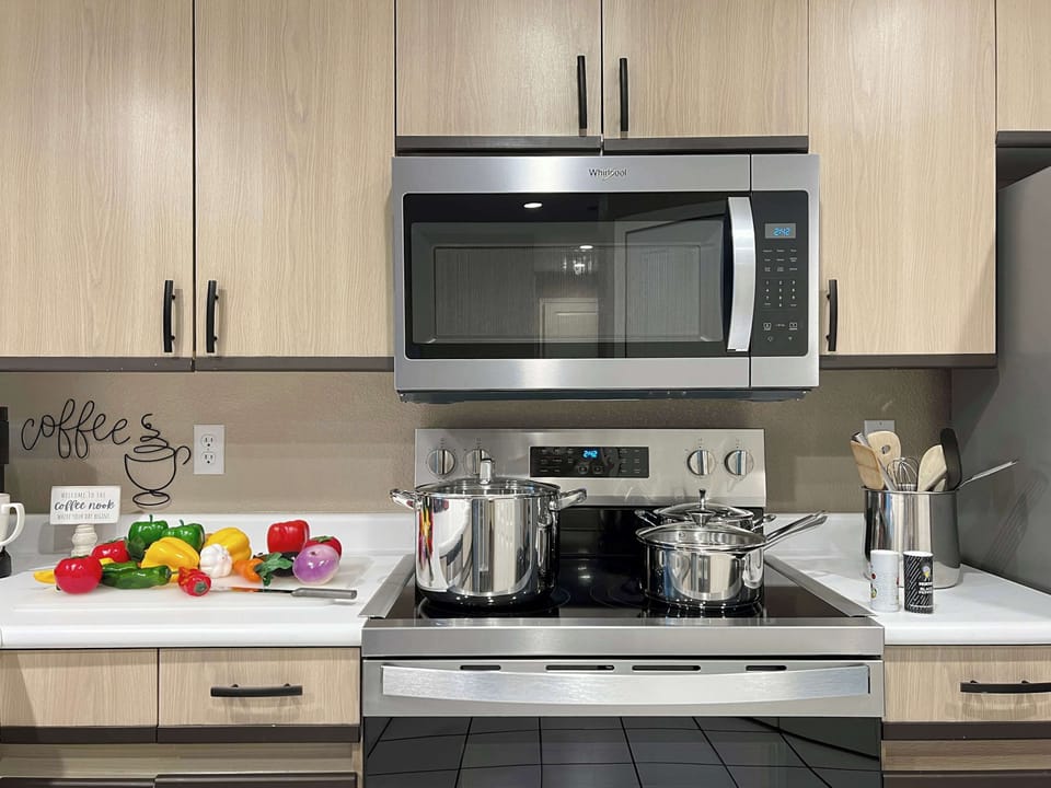 Fully equipped kitchen with full size appliances, pots and pans, utensils and everything you need to prepare a meal for your family.