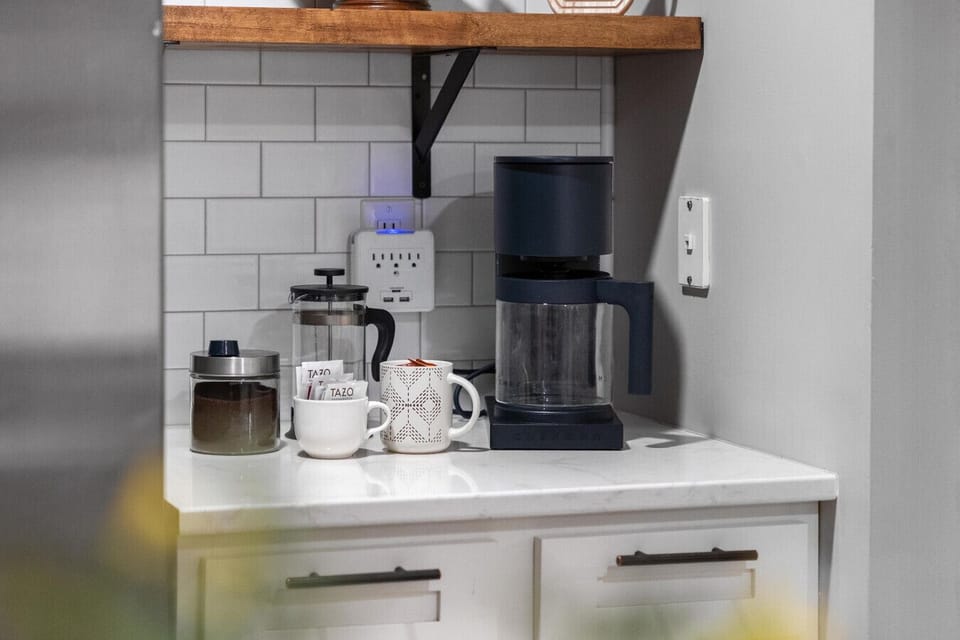 Kitchen with coffee, tea, & starter snacks