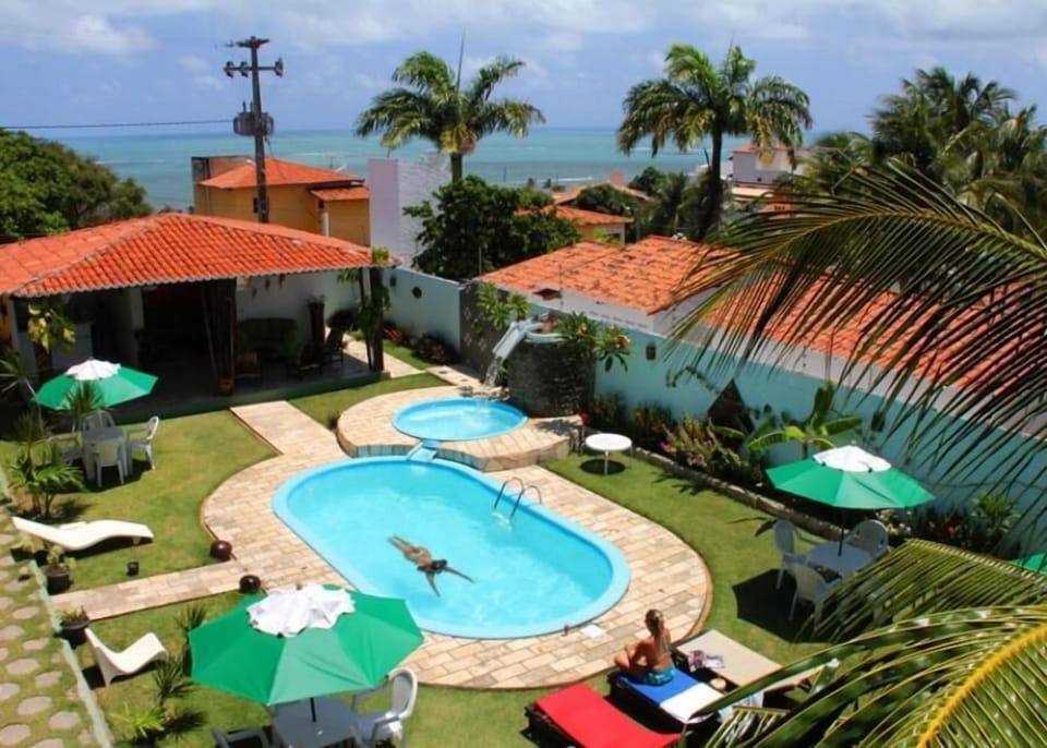 2 outdoor pools, open 8:00 AM to 8:00 PM, pool umbrellas, sun loungers
