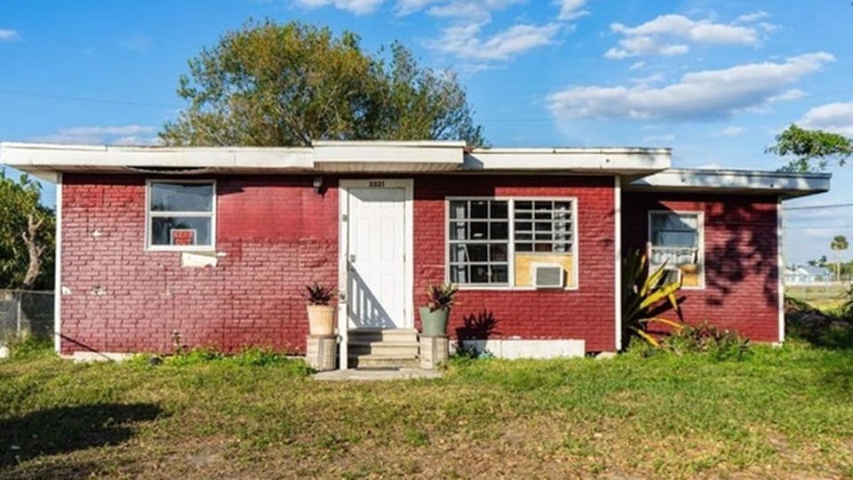 Exterior front view of the red house